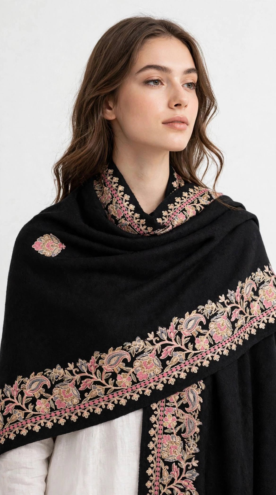 Black Floral Paisley Border Black Pashmina with delicate floral and paisley hand embroidery in blush pink, powder blue and soft gold